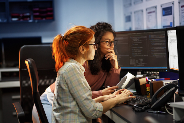 two young women at computer