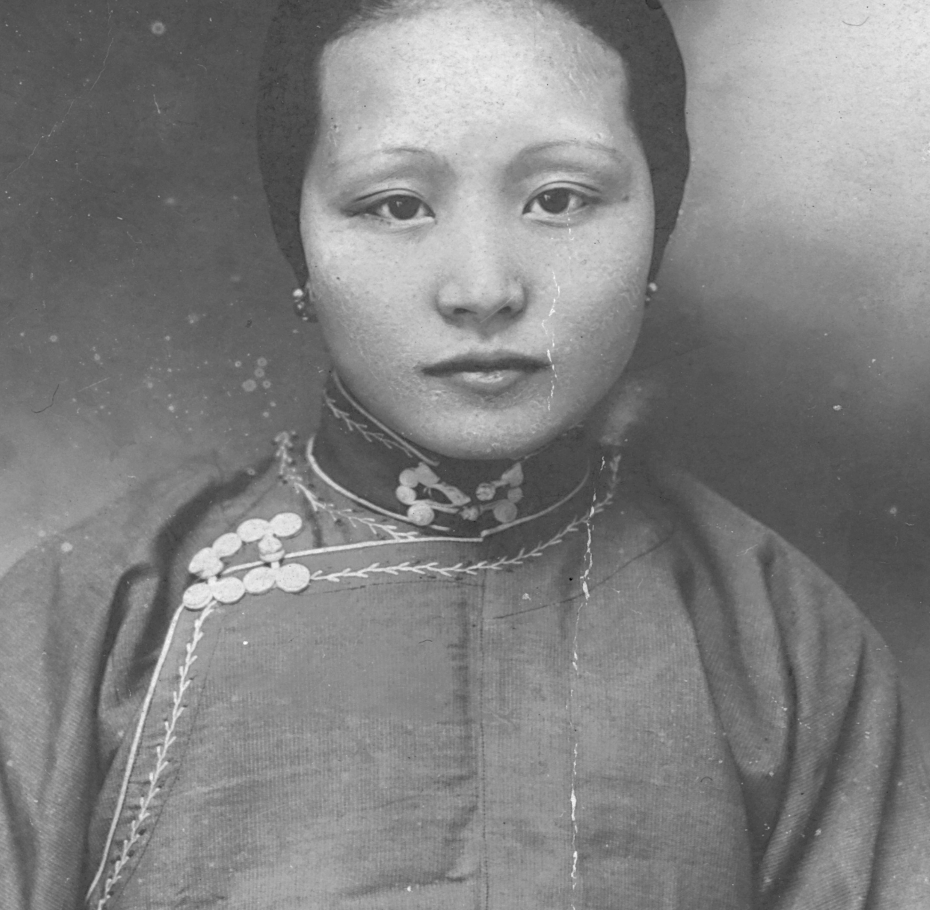 Connie's grandmother, Mrs. Lee Yoke Suey. Photo courtesy of The Californian, Volume 31, Number 2, 2010. A black and white photograph of an Asian woman dressed in traditional garb.