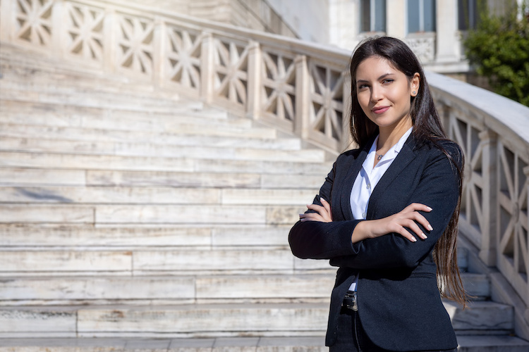 young woman on courthouse steps