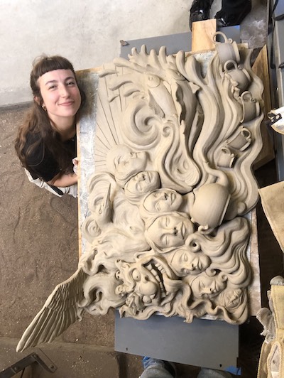 student with sculpture