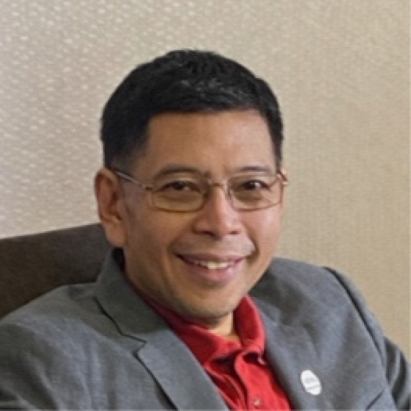 Dr. Christopher Dela Rosa, Interim President