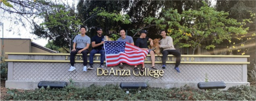Keanu Sindola with other vets on De Anza sign